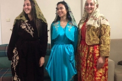 Bella-and-host-family-in-traditional-dresses-from-Kuthaya-768x1024