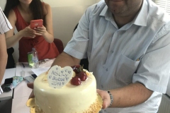 Mesut-Bey-the-language-school-director-presents-a-cake-to-the-students-e1565359663291-768x1024